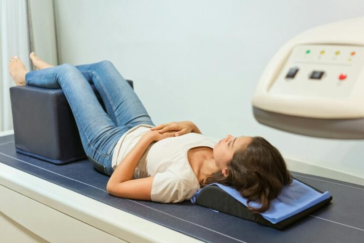 Patient lying on a bone density scanning table