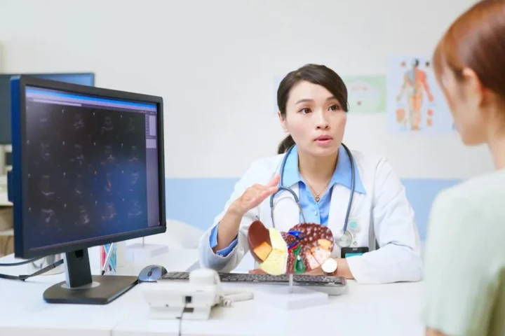A doctor discussing a health assessment with a patient.